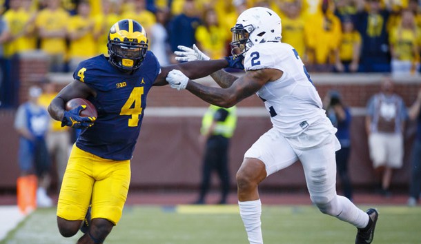 Sep 24, 2016; Ann Arbor, MI, USA; Michigan Wolverines running back De'Veon Smith (4) rushes against Penn State Nittany Lions safety Marcus Allen (2) in the second half at Michigan Stadium. Michigan 49-10. Photo Credit: Rick Osentoski-USA TODAY Sports