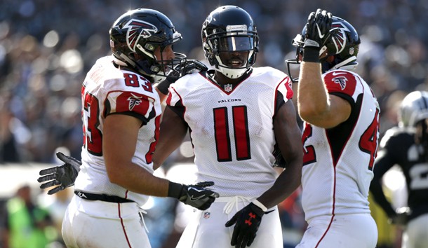 Sep 18, 2016; Oakland, CA, USA; Atlanta Falcons tight end Jacob Tamme (83) is congratulated by wide receiver Julio Jones (11) after catching a touchdown against the Oakland Raiders in the third quarter at Oakland-Alameda County Coliseum. The Falcons defeated the Raiders 35-28. Photo Credit: Cary Edmondson-USA TODAY Sports