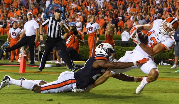 Sep 3, 2016; Auburn, AL, USA; Clemson Tigers wide receiver Hunter Renfrow (13) scores a touchdown ahead of Auburn Tigers defensive back Johnathan Ford (23) during the fourth quarter at Jordan Hare Stadium. Photo Credit: Shanna Lockwood-USA TODAY Sports