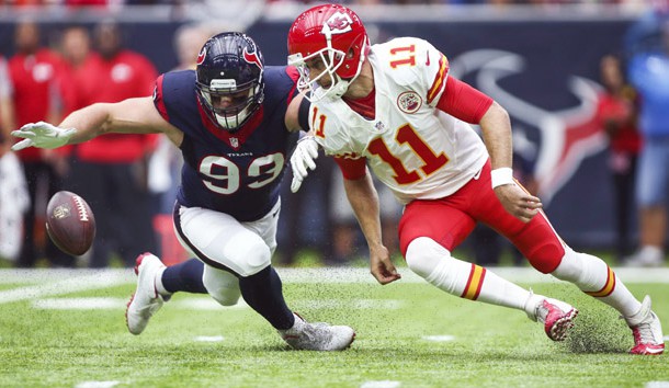 Sep 18, 2016; Houston, TX, USA; Houston Texans defensive end J.J. Watt (99) and Kansas City Chiefs quarterback Alex Smith (11) attempt to recover a fumble during the first quarter at NRG Stadium. Photo Credit: Troy Taormina-USA TODAY Sports