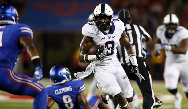 Sep 23, 2016; Dallas, TX, USA;  TCU Horned Frogs wide receiver John Diarse (9) runs the ball against Southern Methodist Mustangs safety Mikial Onu (4) in the third quarter at Gerald J. Ford Stadium. Photo Credit: Tim Heitman-USA TODAY Sports
