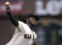 Cueto pitches Giants past Cardinals