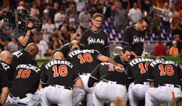 Sep 26, 2016; Miami, FL, USA; Miami Marlins manager Don Mattingly watches as his team takes a knee around the pitchers mound to honor teammate starting pitcher Jose Fernandez after defeating the New York Mets 7-3 at Marlins Park. Photo Credit: Jasen Vinlove-USA TODAY Sports