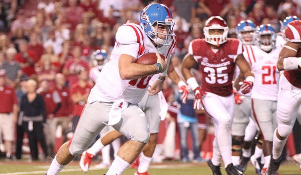 Oct 15, 2016; Fayetteville, AR, USA; Ole Miss Rebels quarterback Chad Kelly (10) rushes for a touchdown in the second quarter against the Arkansas Razorbacks at Donald W. Reynolds Razorback Stadium. Photo Credit: Nelson Chenault-USA TODAY Sports