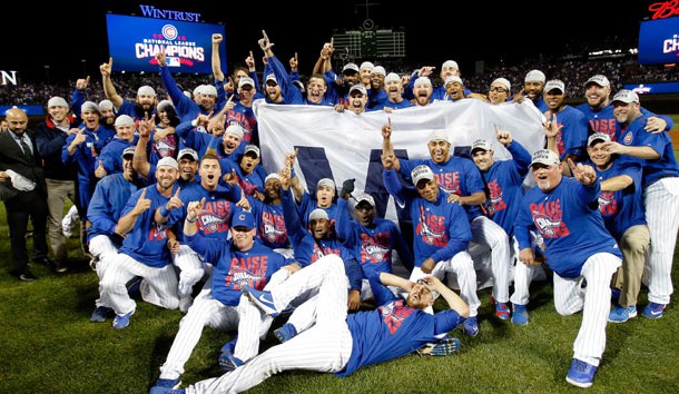 Oct 22, 2016; Chicago, IL, USA; The Chicago Cubs pose for a photo on the pitcher's mound after winning game six of the 2016 NLCS playoff baseball series at Wrigley Field. The Chicago Cubs advance to the World Series. Photo Credit: