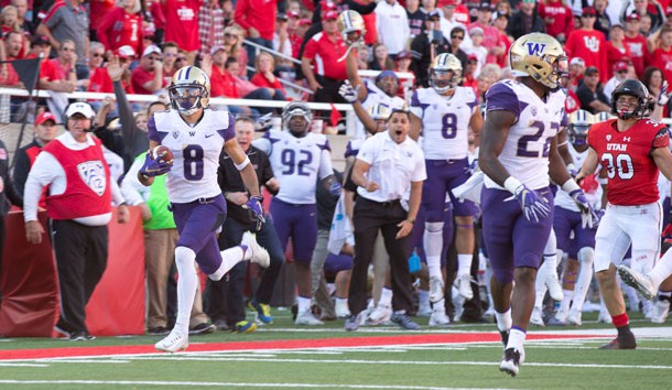 Oct 29, 2016; Salt Lake City, UT, USA; Washington Huskies wide receiver Dante Pettis (8) returns a punt for a touchdown during the second half against the Utah Utes at Rice-Eccles Stadium. Washington won 31-24. Photo Credit: Russ Isabella-USA TODAY Sports