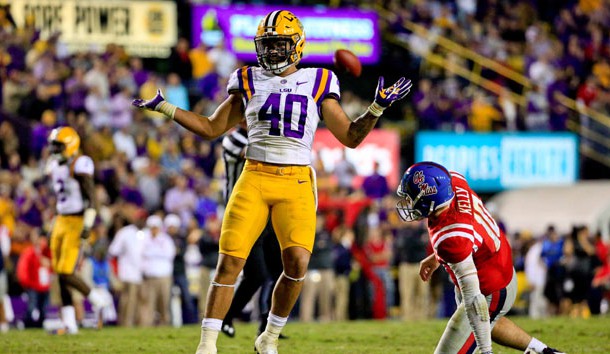 Oct 22, 2016; Baton Rouge, LA, USA; LSU Tigers linebacker Duke Riley (40) celebrates as Mississippi Rebels quarterback Chad Kelly (10) looks on following a defensive stop during the second half of a game at Tiger Stadium. LSU defeated Mississippi 38-21. Photo Credit: Derick E. Hingle-USA TODAY Sports