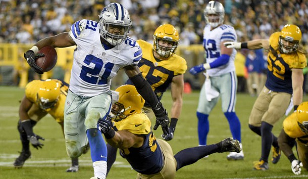 Oct 16, 2016; Green Bay, WI, USA; Dallas Cowboys running back Ezekiel Elliott (21) carries the ball as Green Bay Packers linebacker Nick Perry (53) tackles in the fourth quarter at Lambeau Field. Photo Credit: Benny Sieu-USA TODAY Sports