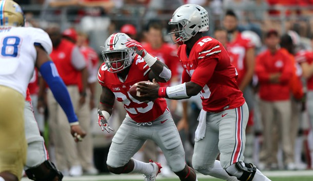 Sep 10, 2016; Columbus, OH, USA; Ohio State Buckeyes running back Mike Weber (25) takes the hand off from quarterback J.T. Barrett (16) in the first half against the Tulsa Golden Hurricane at Ohio Stadium. Photo Credit: Aaron Doster-USA TODAY Sports