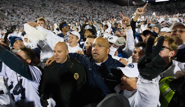 Oct 22, 2016; University Park, PA, USA; Penn State Nittany Lions head coach James Franklin (center) is surrounded by fans following the conclusion of the game against the Ohio State Buckeyes at Beaver Stadium. Penn State defeated Ohio State 24-21. Photo Credit: Matthew O'Haren-USA TODAY Sports