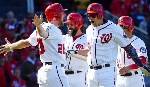 Oct 9, 2016; Washington, DC, USA; Washington Nationals catcher Jose Lobaton (59) celebrates with second baseman Daniel Murphy (20) after hitting a three run home run against the Los Angeles Dodgers during the fourth inning during game two of the 2016 NLDS playoff baseball series at Nationals Park. Photo Credit: Brad Mills-USA TODAY Sports