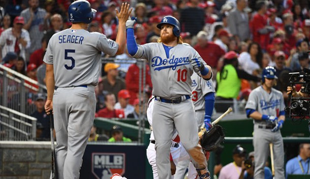 Oct 7, 2016; Washington, DC, USA; Los Angeles Dodgers third baseman Justin Turner (10) is greeted by shortstop Corey Seager (5) after hitting a two run home run against the Washington Nationals in the third inning during game one of the 2016 NLDS playoff baseball series at Nationals Park. Photo Credit: Brad Mills-USA TODAY Sports