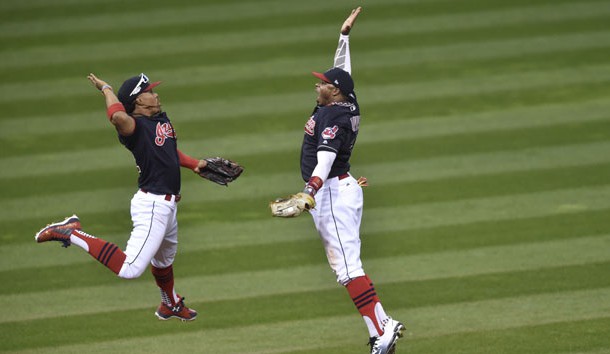 Oct 15, 2016; Cleveland, OH, USA; Cleveland Indians shortstop Francisco Lindor (left) high fives center fielder Rajai Davis (right) after defeating the Toronto Blue Jays in  game two of the 2016 ALCS playoff baseball series at Progressive Field. Cleveland won 2-1. Mandatory Credit: David Richard-USA TODAY Sports