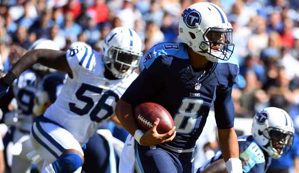Oct 23, 2016; Nashville, TN, USA; Tennessee Titans quarterback Marcus Mariota (8) runs for a first down in the first half against the Tennessee Titans at Nissan Stadium. The Colts won 34-26. Photo Credit: Christopher Hanewinckel-USA TODAY Sports