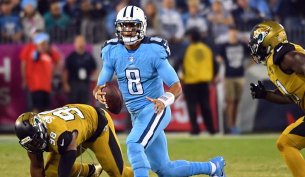 Oct 27, 2016; Nashville, TN, USA; Tennessee Titans quarterback Marcus Mariota (8) scrambles out of the pocket in the first half against the Jacksonville Jaguars at Nissan Stadium. Photo Credit: Christopher Hanewinckel-USA TODAY Sports