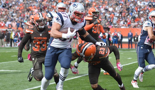Oct 9, 2016; Cleveland, OH, USA; New England Patriots tight end Rob Gronkowski (87) breaks the tackle of Cleveland Browns cornerback Joe Haden (23) during the first quarter at FirstEnergy Stadium. Photo Credit: Ken Blaze-USA TODAY Sports