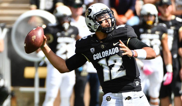 Oct 1, 2016; Boulder, CO, USA; Colorado Buffaloes quarterback Steven Montez (12) prepares to pass a touchdown to wide receiver Shay Fields (not pictured) in the first quarter against the Oregon State Beavers at Folsom Field. Photo Credit: Ron Chenoy-USA TODAY Sports