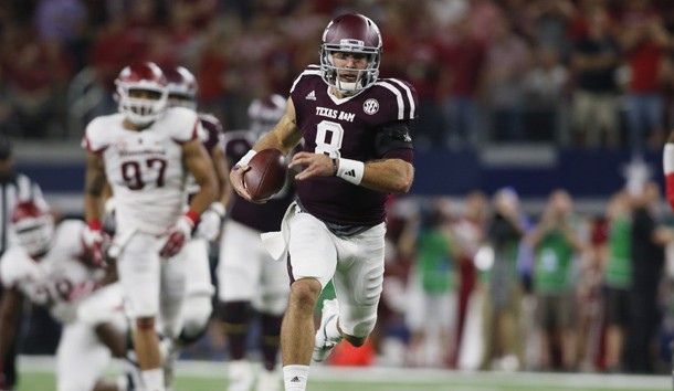 Sep 24, 2016; Dallas, TX, USA; Texas A&M Aggies quarterback Trevor Knight (8) runs for a touchdown in the second quarter against the Arkansas Razorbacks  at AT&T Stadium. Photo Credit: Tim Heitman-USA TODAY Sports