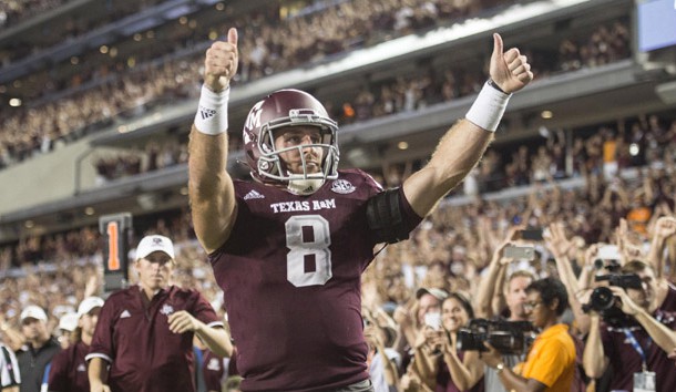 Oct 8, 2016; College Station, TX, USA; Texas A&M Aggies quarterback Trevor Knight (8) celebrates after scoring the game winning touchdown during the second overtime against the Tennessee Volunteers at Kyle Field. The Aggies defeated the Volunteers 45-38 in overtime. Photo Credit: Jerome Miron-USA TODAY Sports