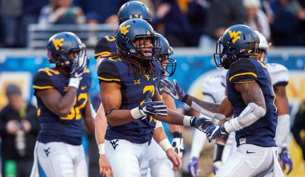 Oct 22, 2016; Morgantown, WV, USA;  West Virginia Mountaineers wide receiver Ka'Raun White (2) celebrates with teammates after catching a touchdown during the third quarter against the TCU Horned Frogs at Milan Puskar Stadium. Photo Credit: Ben Queen-USA TODAY Sports