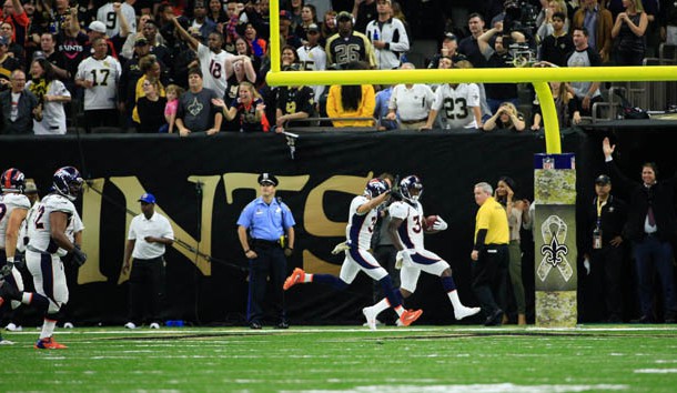 Nov 13, 2016; New Orleans, LA, USA;  Denver Broncos defensive back Will Parks (34) returns a blocked extra point for two points during the fourth quarter of a game against the New Orleans Saints at the Mercedes-Benz Superdome. The Broncos defeated the Saints 25-23. Photo Credit: Derick E. Hingle-USA TODAY Sports