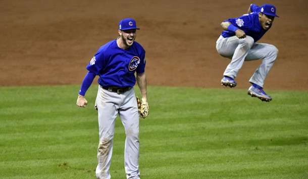 Nov 2, 2016; Cleveland, OH, USA; Chicago Cubs third baseman Kris Bryant (left) and shortstop Addison Russell (right) celebrate after defeating the Cleveland Indians in game seven of the 2016 World Series at Progressive Field. Photo Credit: David Richard-USA TODAY Sports
