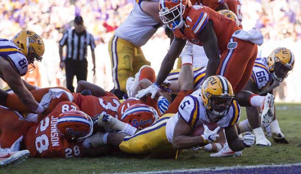 Nov 19, 2016; Baton Rouge, LA, USA; LSU Tigers running back Derrius Guice (5) is stopped short of the goal line on third down against the Florida Gators during the second half at Tiger Stadium. The Gators defeat the Tigers 16-10. Photo Credit: Jerome Miron-USA TODAY Sports