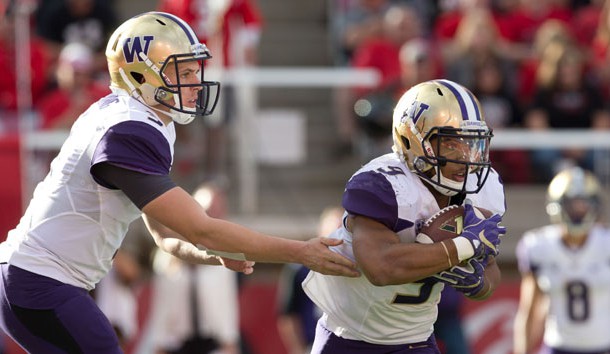 Oct 29, 2016; Salt Lake City, UT, USA; Washington Huskies quarterback Jake Browning (3) hands off the ball to running back Myles Gaskin (9) during the second half against the Utah Utes at Rice-Eccles Stadium. Washington won 31-24. Photo Credit: Russ Isabella-USA TODAY Sports