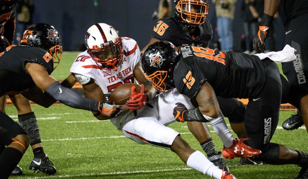 Nov 12, 2016; Stillwater, OK, USA; Texas Tech Red Raiders wide receiver Keke Coutee (20) tackled by Oklahoma State Cowboys linebacker Justin Phillips (19) during the second half at Boone Pickens Stadium. Cowboys won 45-44. Photo Credit: Rob Ferguson-USA TODAY Sports
