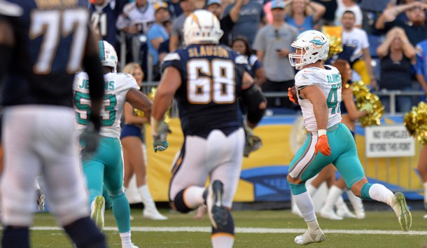 Nov 13, 2016; San Diego, CA, USA; Miami Dolphins middle linebacker Kiko Alonso (47) runs back an interception for a touchdown during the fourth quarter against the San Diego Chargers at Qualcomm Stadium. Photo Credit: Jake Roth-USA TODAY Sports