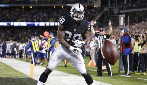 Nov 6, 2016; Oakland, CA, USA; Oakland Raiders running back Latavius Murray (28) reacts after scoring a touchdown, before having the play called back because of a penalty, during action against the Denver Broncos in the second quarter at Oakland Coliseum. Murray would go on to rush for a touchdown later in the drive. Photo Credit: Cary Edmondson-USA TODAY Sports