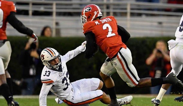 Nov 12, 2016; Athens, GA, USA; Georgia Bulldogs defensive back Maurice Smith (2) runs past Auburn Tigers receiver Will Hastings (33) after intercepting a pass and returning it for a touchdown during the second half at Sanford Stadium. Georgia defeated Auburn 13-7. Photo Credit: Dale Zanine-USA TODAY Sports