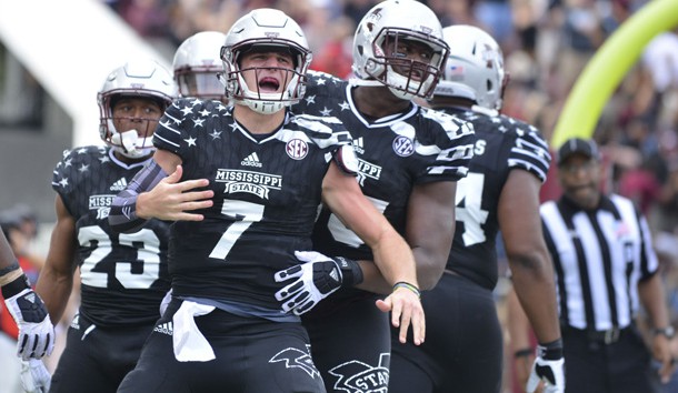 Nov 5, 2016; Starkville, MS, USA; Mississippi State Bulldogs quarterback Nick Fitzgerald (7) celebrates with teammates after a touchdown in the third quarter against the Texas A&M Aggies at Davis Wade Stadium. Mississippi State won 35-28. Photo Credit: Matt Bush-USA TODAY Sports