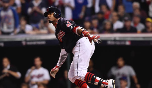 Nov 2, 2016; Cleveland, OH, USA; Cleveland Indians center fielder Rajai Davis (20) hits a two-run home run against the Chicago Cubs in the 8th inning in game seven of the 2016 World Series at Progressive Field. Photo Credit: Ken Blaze-USA TODAY Sports