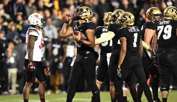 Nov 26, 2016; Boulder, CO, USA; Colorado Buffaloes quarterback Sefo Liufau (13) signals upwards as time expires in the fourth quarter against the Utah Utes at Folsom Field. The Buffaloes defeated the Utes 27-22. Photo Credit: Ron Chenoy-USA TODAY Sports
