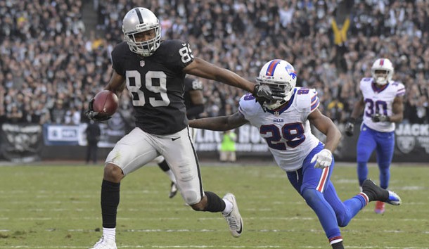 Dec 4, 2016; Oakland, CA, USA; Oakland Raiders wide receiver Amari Cooper (89) is defended by Buffalo Bills cornerback Kevon Seymour (29) on a 37-yard touchdown reception in the fourth quarter during a NFL football game at Oakland Coliseum. The Raiders defeated the Bills 38-24. Photo Credit: Kirby Lee-USA TODAY Sports