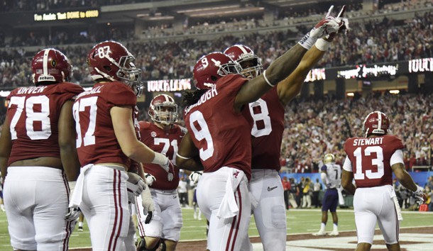 Dec 31, 2016; Atlanta, GA, USA;  Alabama Crimson Tide running back Bo Scarbrough (9) ccelebrates with teammates after running the ball for a touchdown against the Washington Huskies during the fourth quarter in the 2016 CFP semifinal at the Peach Bowl at the Georgia Dome. Photo Credit: Dale Zanine-USA TODAY Sports