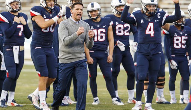 Nov 26, 2016; East Hartford, CT, USA; Connecticut Huskies head coach Bob Diaco watches as his team  warms up before the start of the game against the Tulane Green Wave at Rentschler Field. Photo Credit: David Butler II-USA TODAY Sports