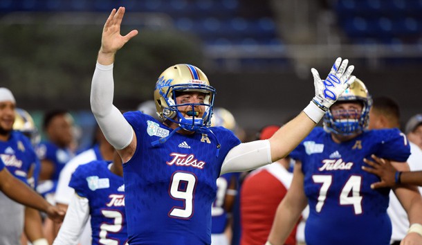 Dec 19, 2016; Miami, FL, USA; Tulsa Golden Hurricane quarterback Dane Evans (9) celebrates after Tulsa Golden Hurricane defensive tackle Jesse Brubaker (not pictured) made an interception catch for a touchdown during the second half against Central Michigan Chippewas at Marlins Park. Photo Credit: Steve Mitchell-USA TODAY Sports
