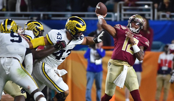 Dec 30, 2016; Miami Gardens, FL, USA;  Florida State Seminoles quarterback Deondre Francois (12) attempts a pass against the Michigan Wolverines during the first half at Hard Rock Stadium. Photo Credit: Jasen Vinlove-USA TODAY Sports