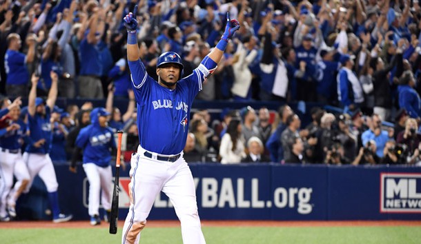 Oct 4, 2016; Toronto, Ontario, CAN; Toronto Blue Jays designated hitter Edwin Encarnacion (10) hits a walk off home run to beat the Baltimore Orioles during the eleventh inning in the American League wild card playoff baseball game at Rogers Centre. Photo Credit: Nick Turchiaro-USA TODAY Sports