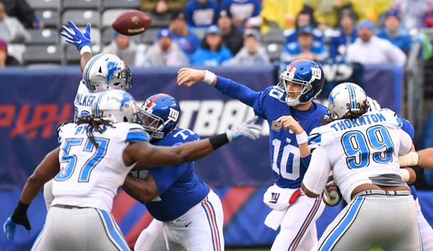 Dec 18, 2016; East Rutherford, NJ, USA; New York Giants quarterback Eli Manning (10) throws the ball during the first quarter against the Lions at MetLife Stadium. Photo Credit: Robert Deutsch-USA TODAY Sports