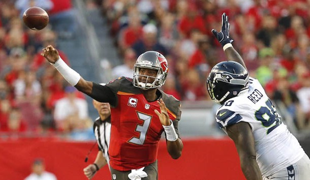 Nov 27, 2016; Tampa, FL, USA; Tampa Bay Buccaneers quarterback Jameis Winston (3) throws a pass as Seattle Seahawks defensive tackle Jarran Reed (90) closes in during the second quarter of an NFL football game at Raymond James Stadium. Photo Credit: Reinhold Matay-USA TODAY Sports