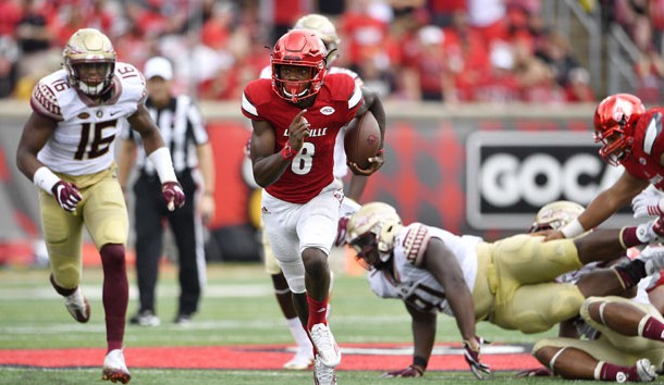 Sep 17, 2016; Louisville, KY, USA;  Louisville Cardinals quarterback Lamar Jackson (8) runs the ball against the Florida State Seminoles during the second half at Papa John's Cardinal Stadium. Louisville defeated Florida State 63-20.  Photo Credit: Jamie Rhodes-USA TODAY Sports