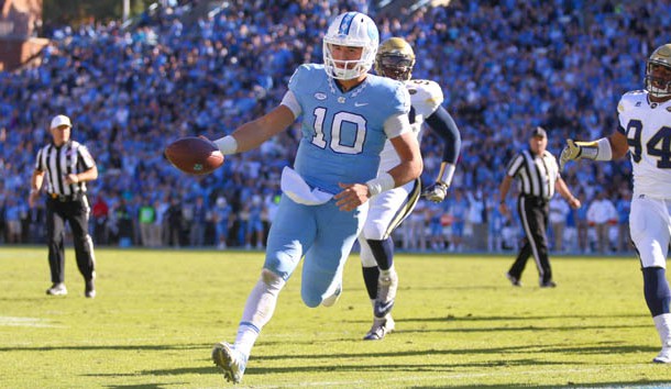 Nov 5, 2016; Chapel Hill, NC, USA;  North Carolina Tar Heels quarterback Mitch Trubisky (10) scores a touchdown on his forth quarter run against the Georgia Tech Yellow Jackets at Kenan Memorial Stadium. The North Carolina Tar Heels defeated the Georgia Tech Yellow Jackets 48-20. Photo Credit: James Guillory-USA TODAY Sports