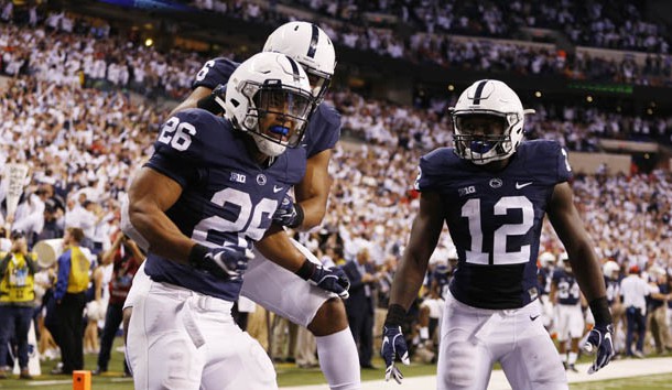 Dec 3, 2016; Indianapolis, IN, USA; Penn State Nittany Lions running back Saquon Barkley (26) celebrates with teammates after catching a touchdown pass against the Wisconsin Badgers in the second half during the Big Ten Championship college football game at Lucas Oil Stadium. Photo Credit: Brian Spurlock-USA TODAY Sports