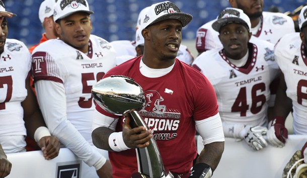 Dec 3, 2016; Annapolis, MD, USA; Temple Owls quarterback Phillip Walker (8) holds American Athletic Conference football trophy during a post game celebration after defeating Navy Midshipmen 34-10 at Navy-Marine Corps Memorial Stadium. Photo Credit: Tommy Gilligan-USA TODAY Sports