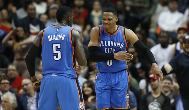 Dec 5, 2016; Atlanta, GA, USA; Oklahoma City Thunder guard Russell Westbrook (0) celebrates a play with guard Victor Oladipo (5) in the fourth quarter of their game against the Atlanta Hawks at Philips Arena. The Thunder won 102-99. Photo Credit: Jason Getz-USA TODAY Sports