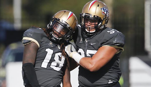 Nov 12, 2016; Orlando, FL, USA;  UCF Knights defensive lineman Jock Petree (97) congratulates linebacker Shaquem Griffin (18) on his third sack of the game during the second half of a football game against the Cincinnati Bearcats at Bright House Networks Stadium. UCF won 24-3 and with the win become bowl eligible. Photo Credit: Reinhold Matay-USA TODAY Sports