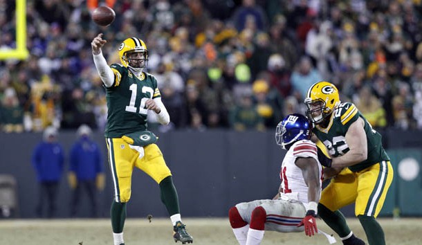Jan 8, 2017; Green Bay, WI, USA;  Green Bay Packers quarterback Aaron Rodgers (12) drops back to pass against the New York Giants during the second half in the NFC Wild Card playoff football game at Lambeau Field. Mandatory Credit: Jeff Hanisch-USA TODAY Sports